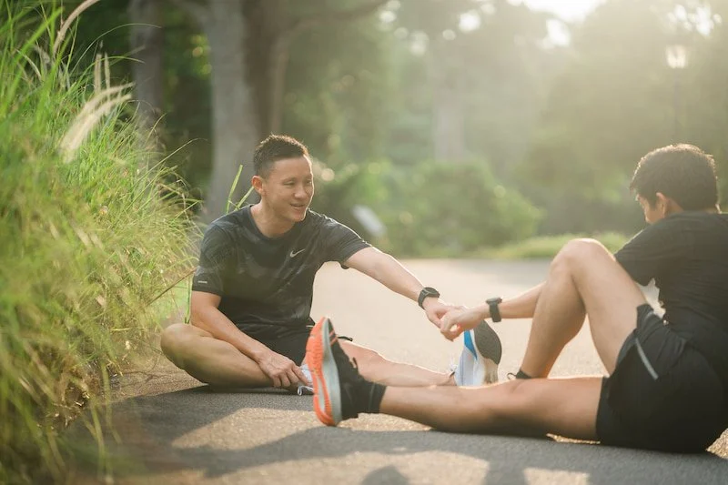 Running doctor Dr Bryan stretching