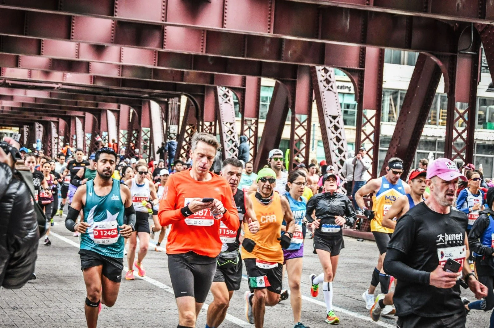 Running marathon checking watch